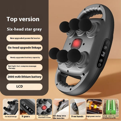Gray six-head percussion massage gun showing LCD display, multiple attachments, and adjustable settings.