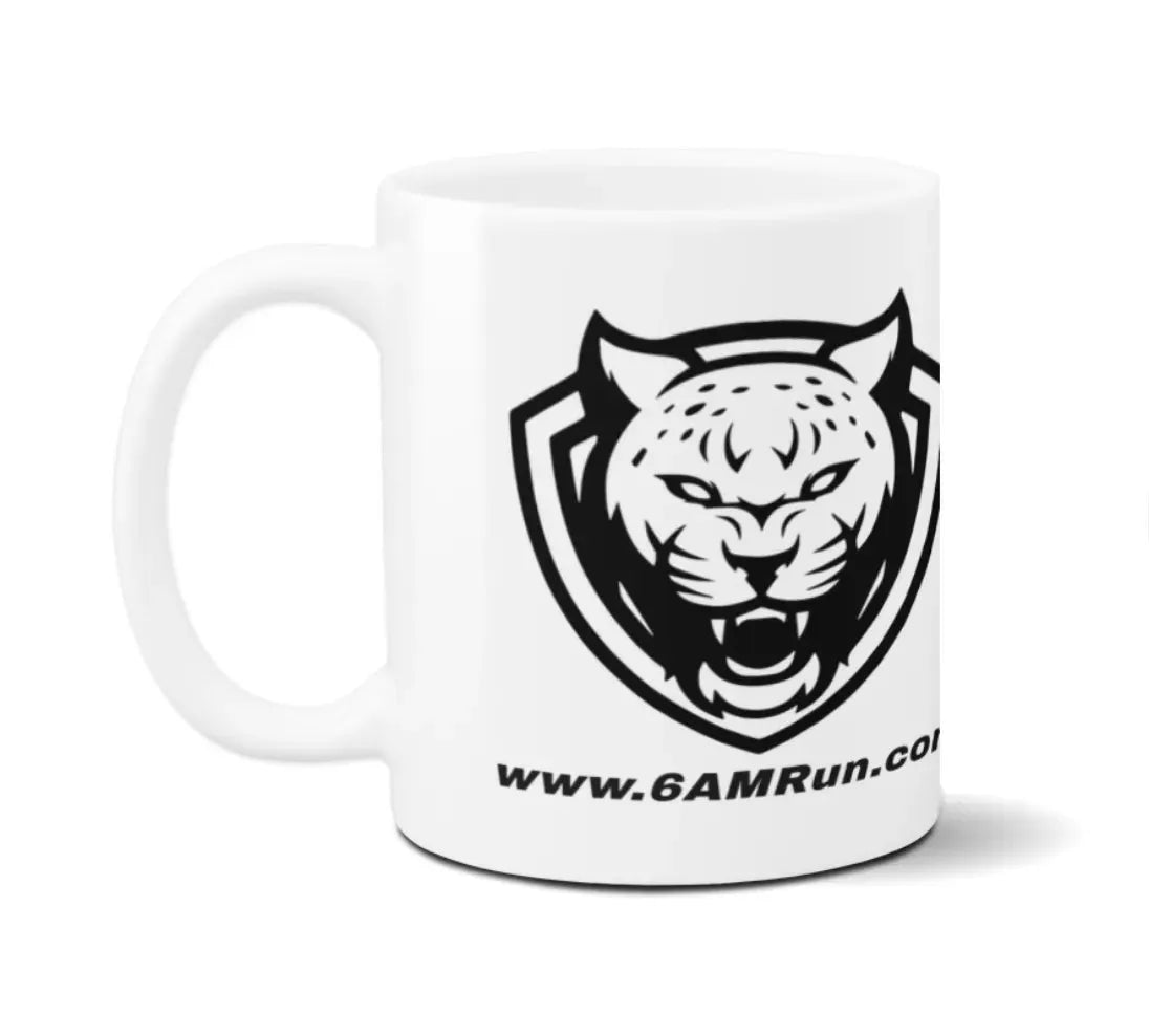 White ceramic 6AMRun coffee mug featuring the black 6AMRun tiger logo and website address, designed for enjoying coffee, tea, or other hot beverages at home, the office, or on the go.