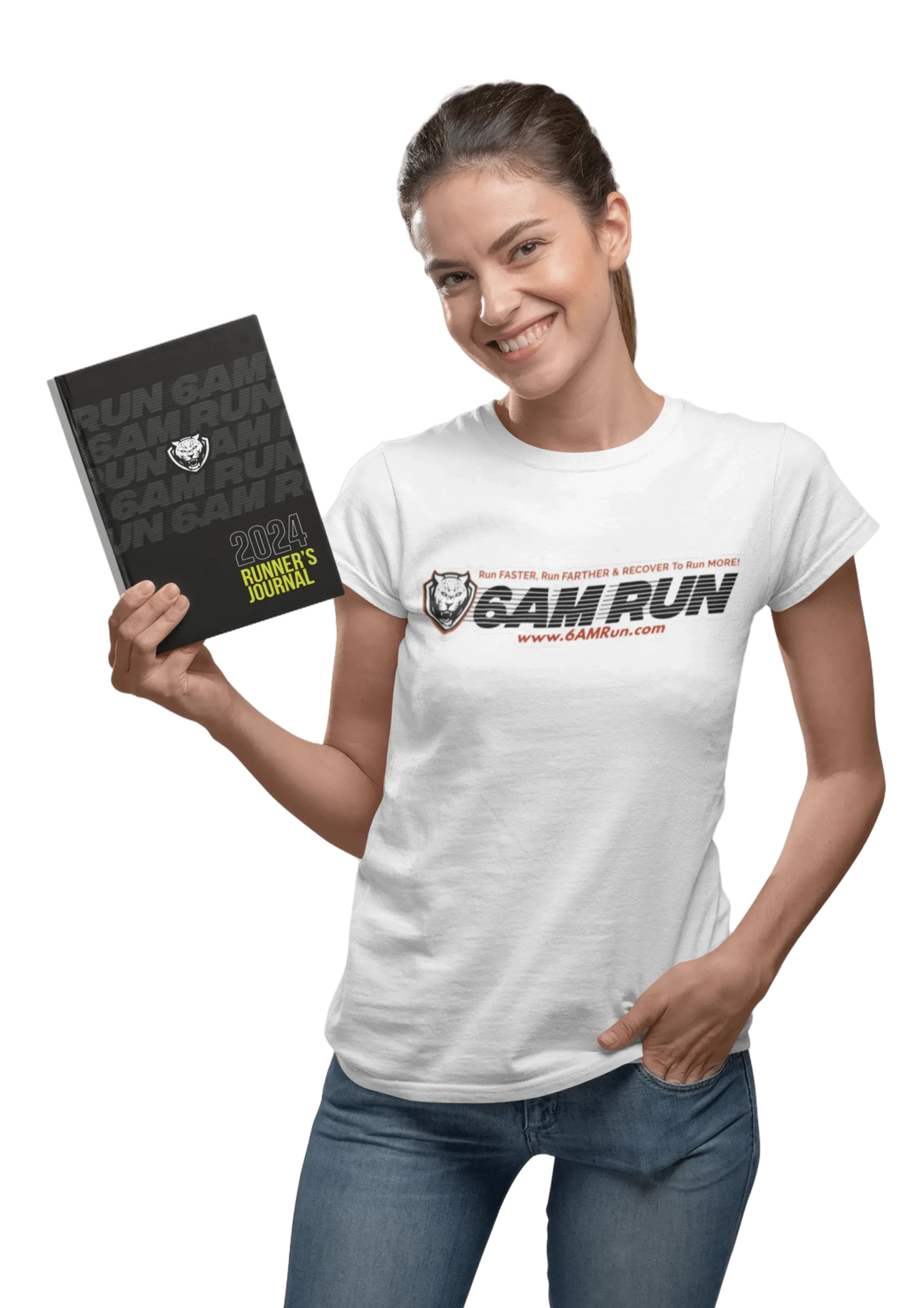 Smiling woman wearing a white 6AMRun T-shirt while holding the 6AMRun 52-Week Runner's Journal, showcasing the running journal and brand apparel for runners and fitness enthusiasts.