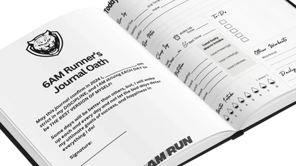 Open 6AMRun Runner's Journal displaying the Runner's Oath, daily workout tracker, nutrition log, hydration tracker, and training pages designed to help runners organize goals, workouts, and running progress.