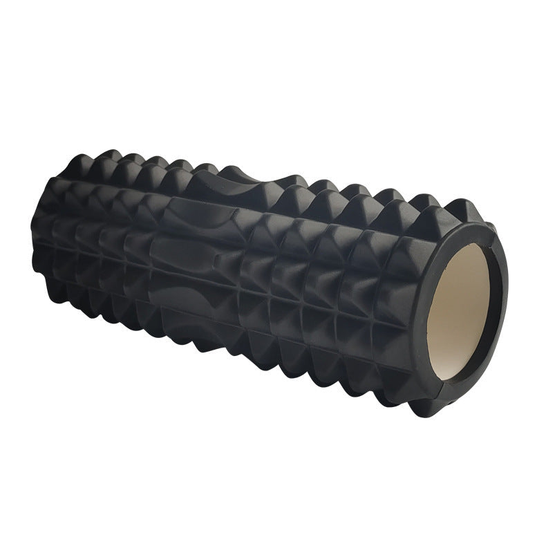 Black high-density textured foam roller with a multi-zone surface pattern, designed for muscle massage, stretching, yoga, Pilates, fitness training, and post-workout recovery, displayed on a white background.