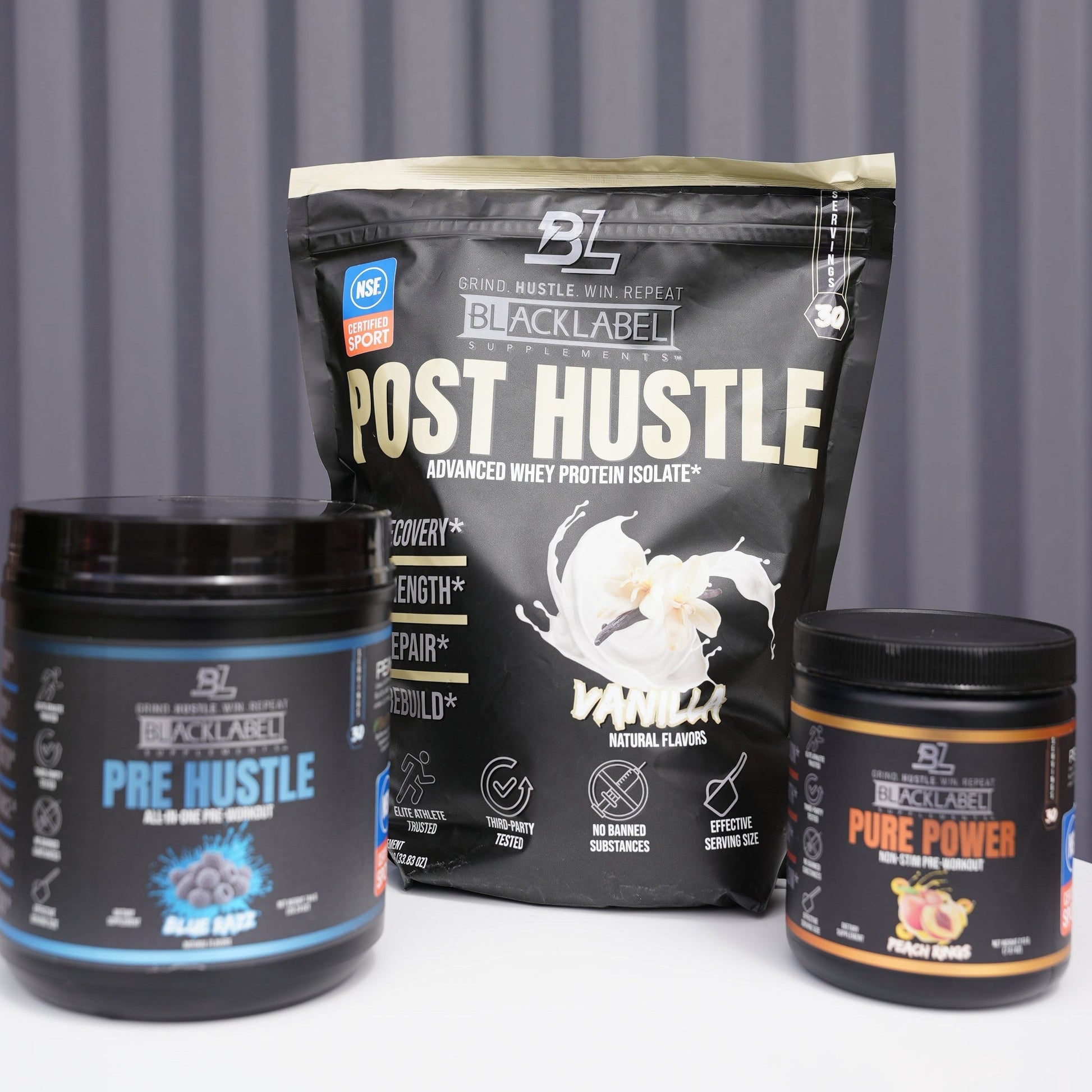 BlackLabel Pre Hustle, Post Hustle, and Pure Power products on a gray background