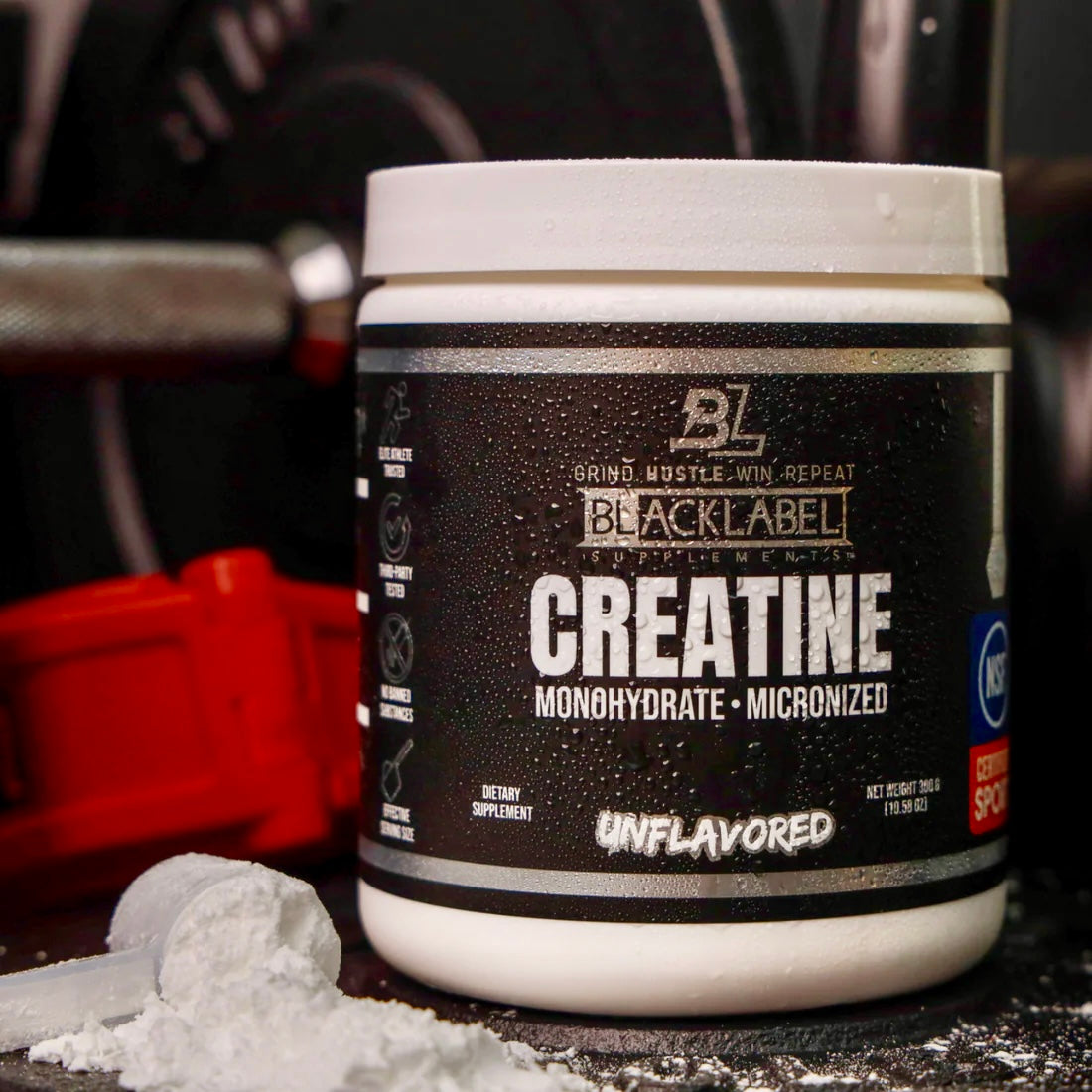 BlackLabel Creatine Monohydrate Micronized supplement container on a dark surface with blurred background