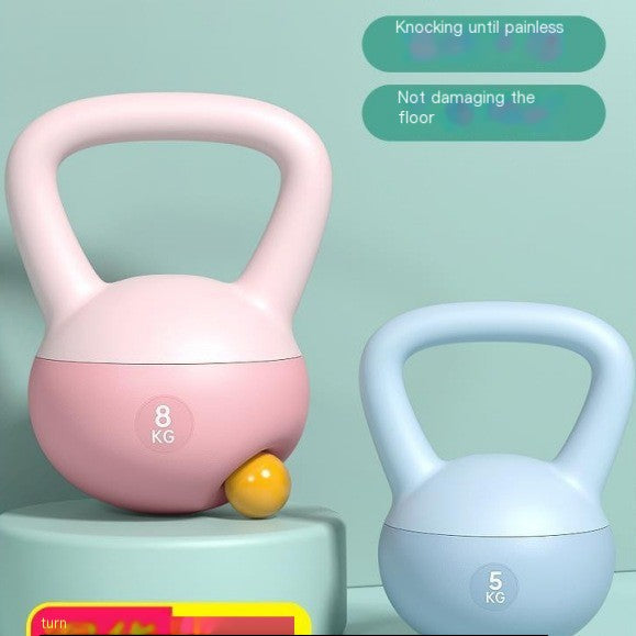 Pink 8 kg and blue 5 kg soft adjustable kettlebells with ergonomic handles, showcasing sand-filled, floor-friendly weights designed for home strength training, cardio workouts, and functional fitness.