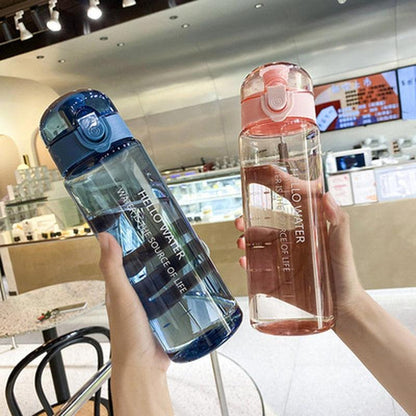 Blue and pink 780ml sports water bottles with flip-top lids and built-in straws