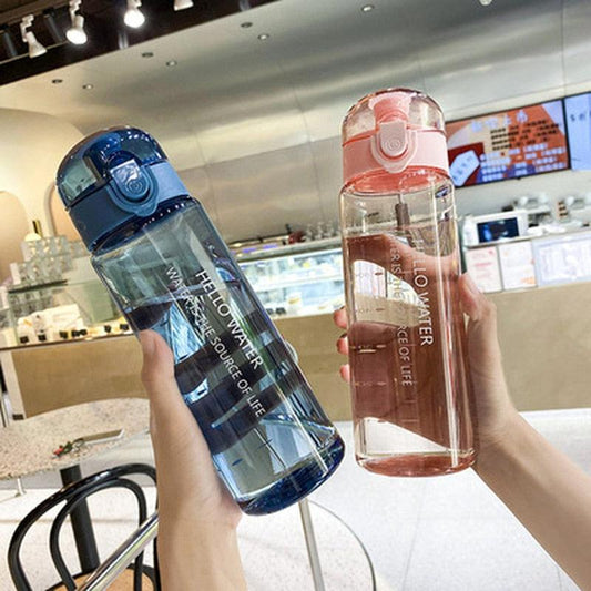 Blue and pink 780ml sports water bottles with flip-top lids and built-in straws