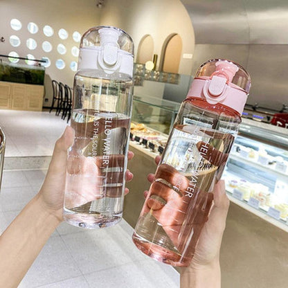 Clear and pink 780ml sports water bottles with flip-top lids and built-in straws