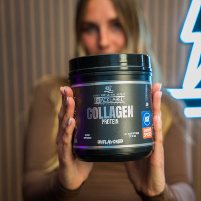 BLACKLABEL Collagen Protein Powder container held in hands with product shown against a blurred background