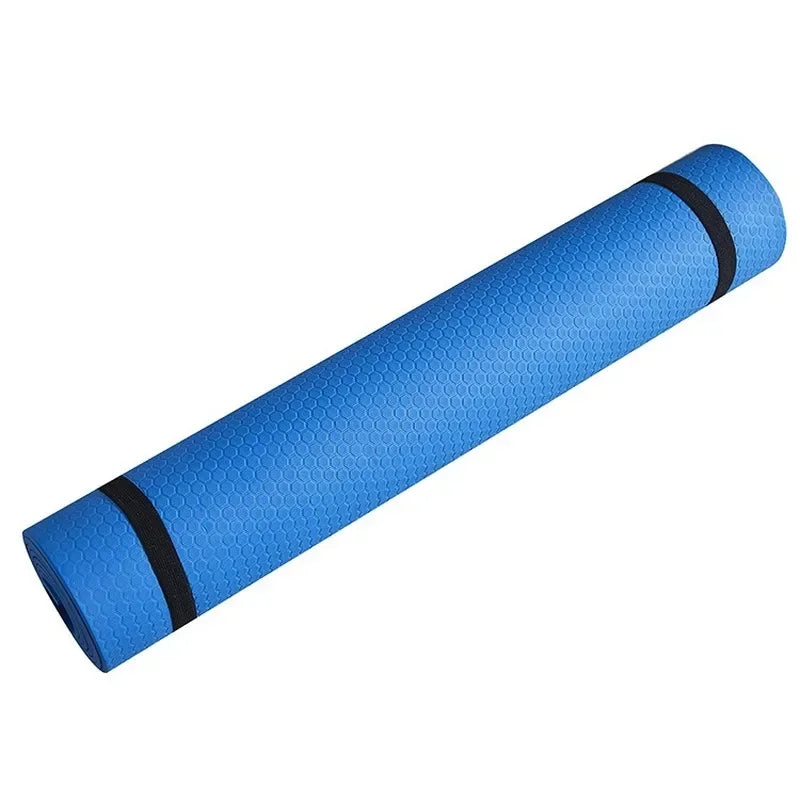 Blue 6mm TPE yoga mat rolled with black straps featuring textured surface for yoga, Pilates, stretching, and fitness workouts
