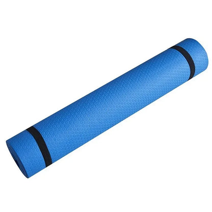 Blue 6mm TPE yoga mat rolled with black straps featuring textured surface for yoga, Pilates, stretching, and fitness workouts