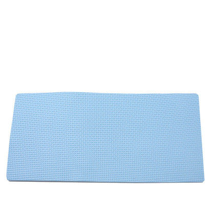Light blue textured exercise mat designed for use with an ab roller, shown on a white background to help protect floors and improve workout comfort.