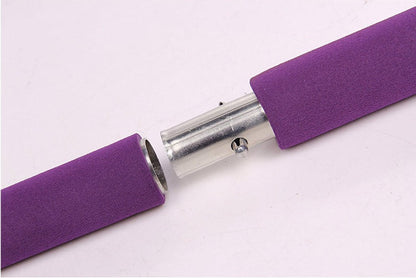 Close-up of the detachable metal connector on a portable Pilates bar resistance band training kit, showing the secure quick-connect design for easy assembly and storage.