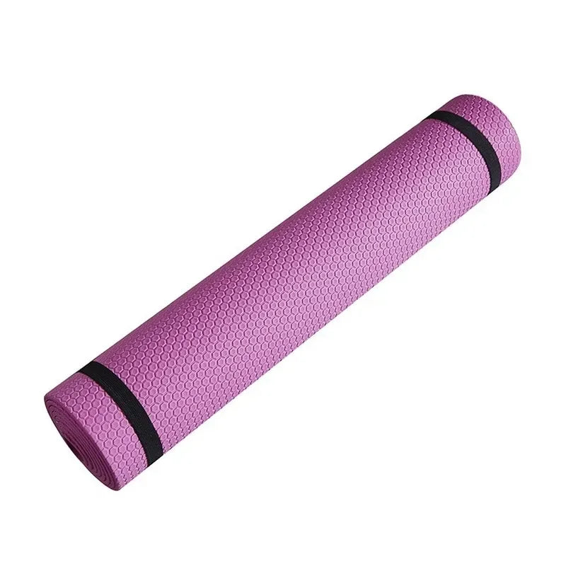 Pink 6mm TPE yoga mat rolled with black straps featuring textured surface for yoga, Pilates, stretching, and fitness workouts