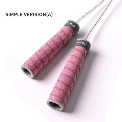 Pink standard adjustable speed jump rope with textured ergonomic handles and a durable PVC-coated cable for cardio, boxing, HIIT, and home fitness workouts.