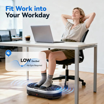 Woman using a quiet vibration plate exercise machine under a desk while working, demonstrating compact, low-noise home and office fitness equipment.