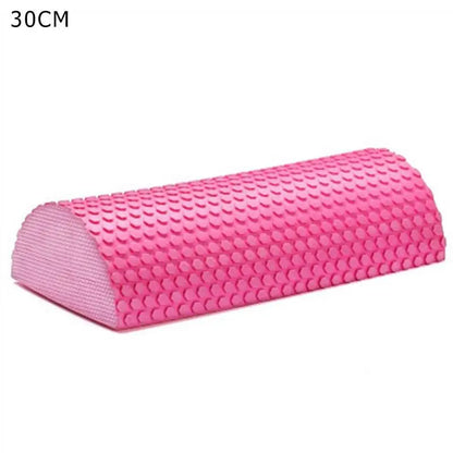 Pink 30 cm half-round EVA foam roller with a textured non-slip surface for yoga, Pilates, balance training, stretching, mobility exercises, and self-massage.