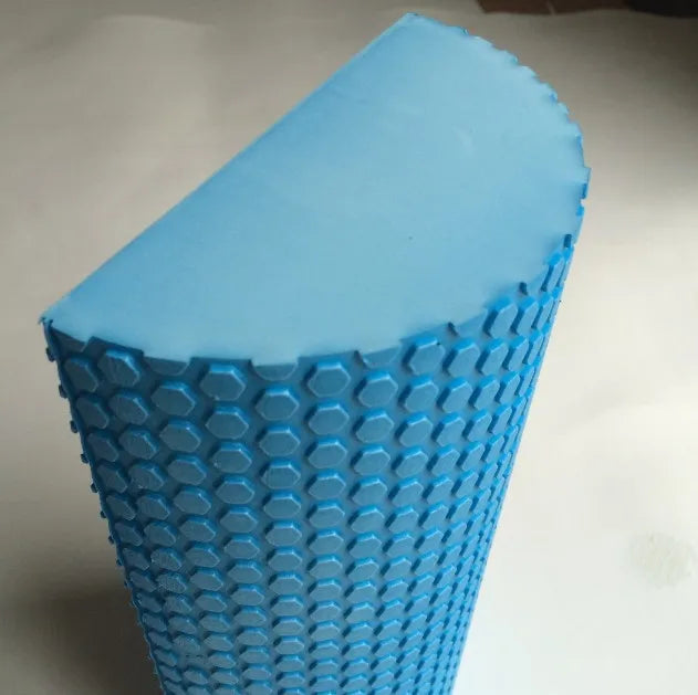 Close-up of a half-round EVA foam roller with a textured non-slip surface for yoga, Pilates, balance training, stretching, and self-massage.